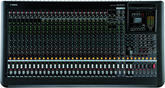 Yamaha audio mixing console with various controls and display on a black background