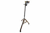 Metal stand with adjustable head on a blue background