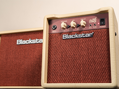 Two Blackstar guitar amplifiers on a beige background