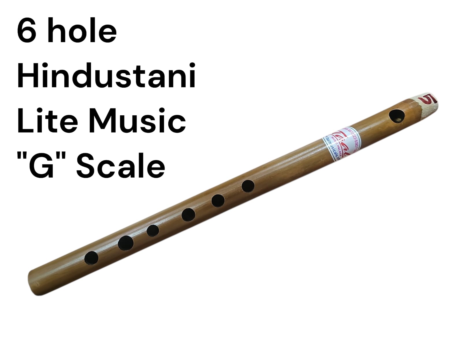 Bamboo flute with six holes on a white background, labeled '6 hole Hindustani Lite Music G Scale'.