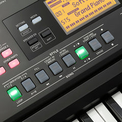Close-up of a keyboard controller with control panel and display.