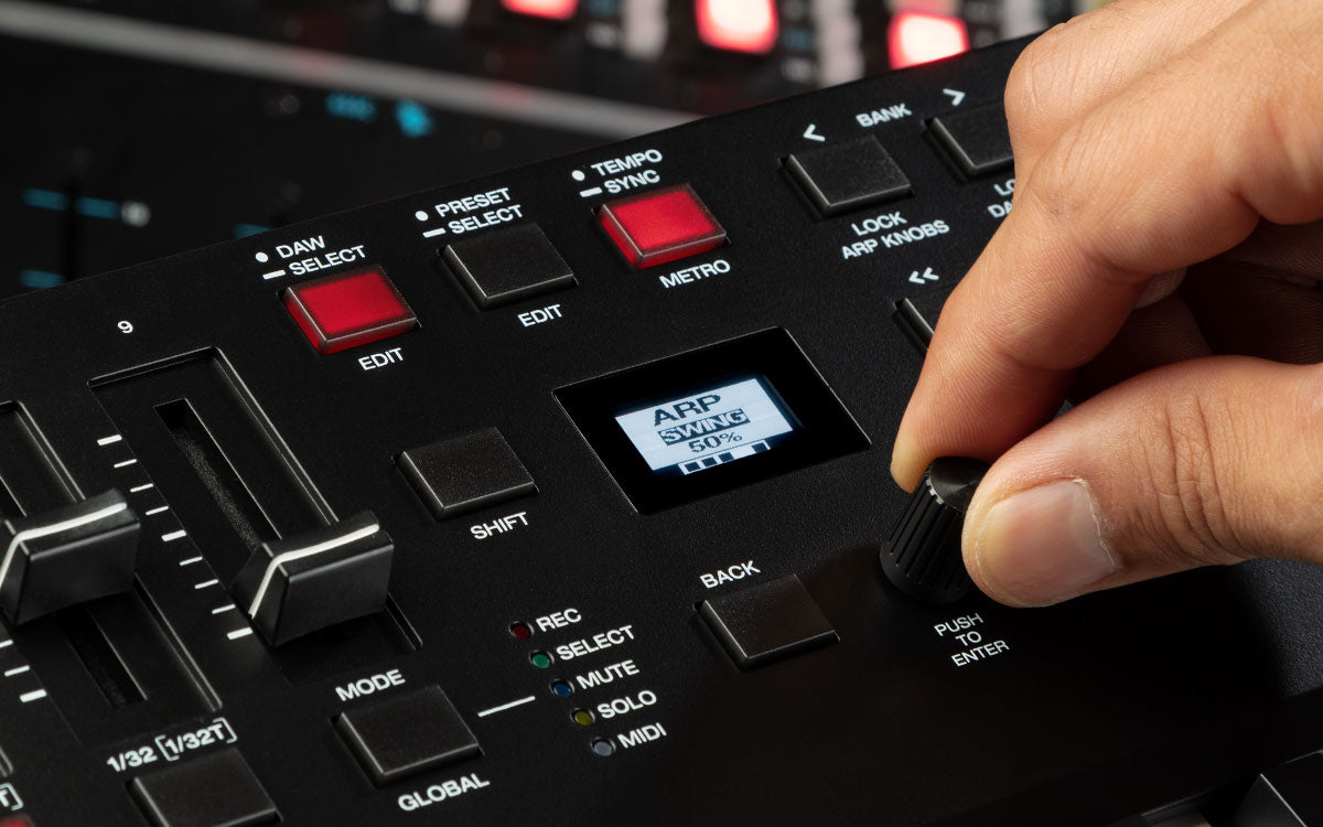 Hand interacting with a digital music controller