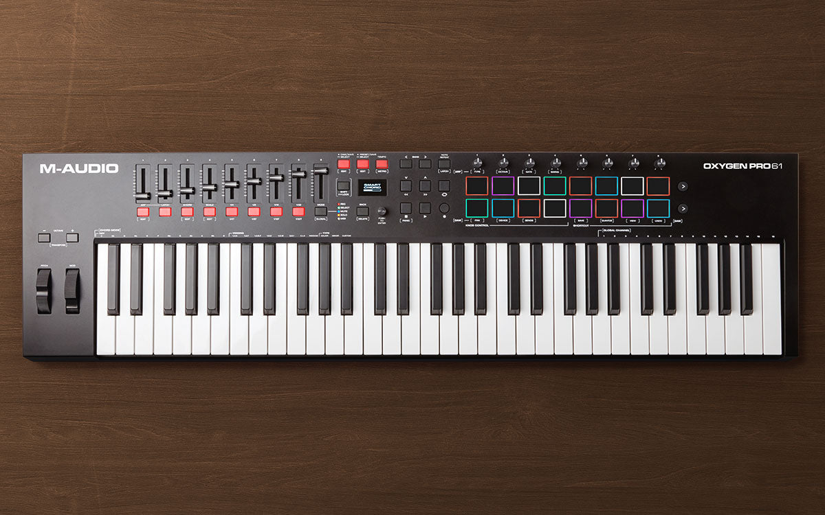 M-Audio keyboard controller on a wooden surface