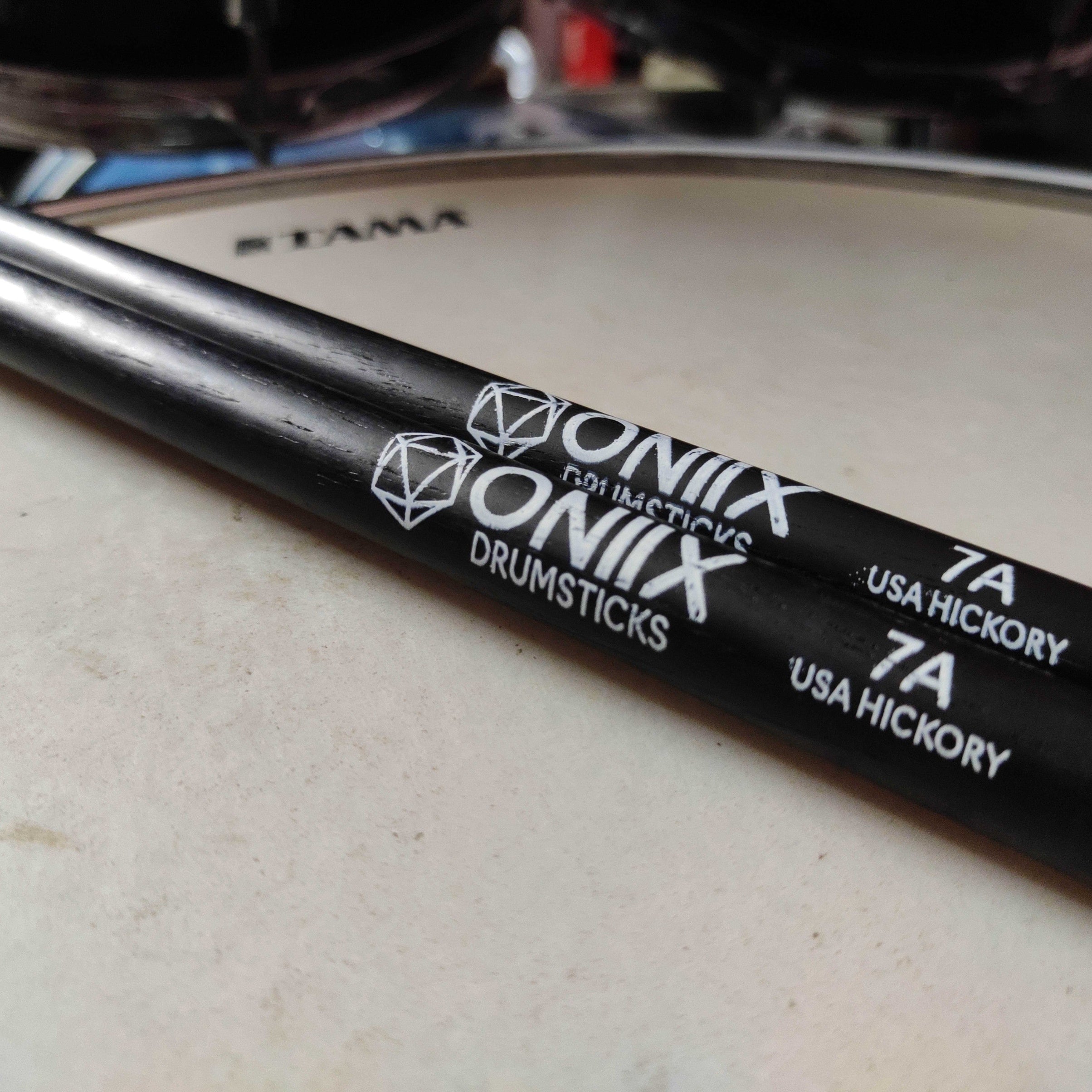 Pair of Onix drumsticks 