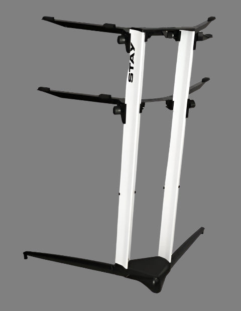 White and black keyboard stand on a white background