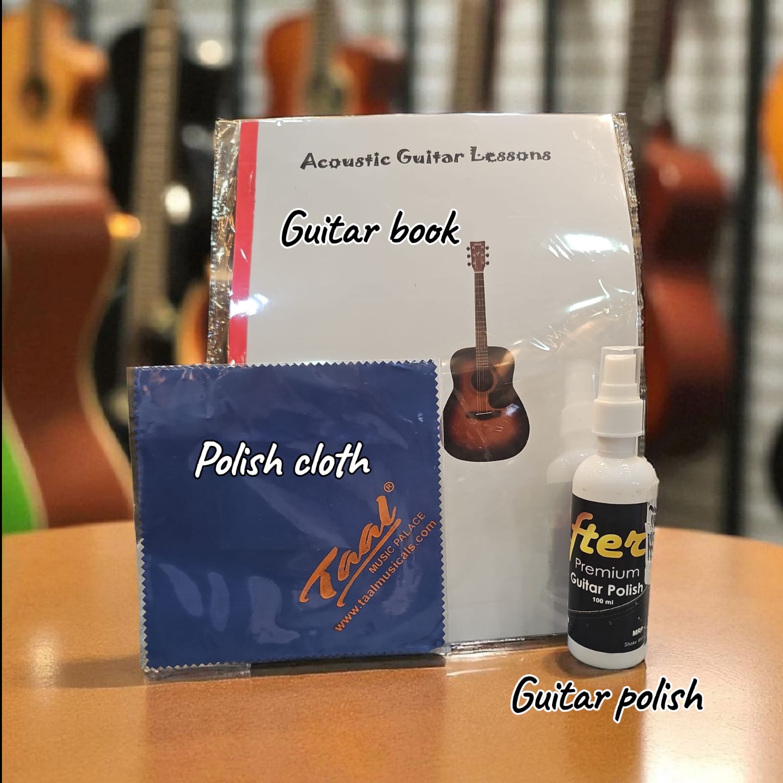 Guitar care products including a book, cloth, and polish spray d