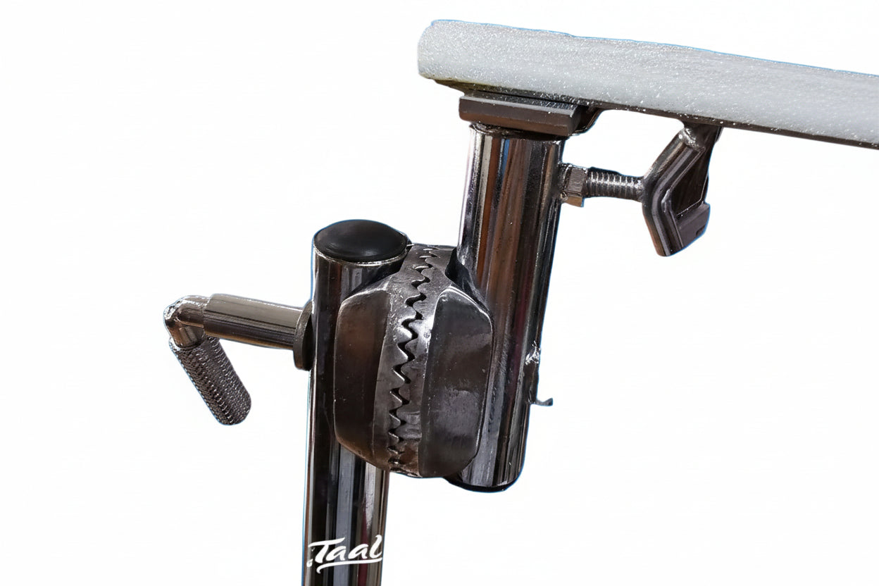 Close-up of a metal clamp with a textured grip on a white background